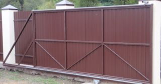 Купить откатные ворота из профнастила Ахтубинск, цена от 1768 руб.
