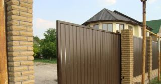 Купить откатные ворота из профнастила Ахтубинск, цена от 1768 руб.